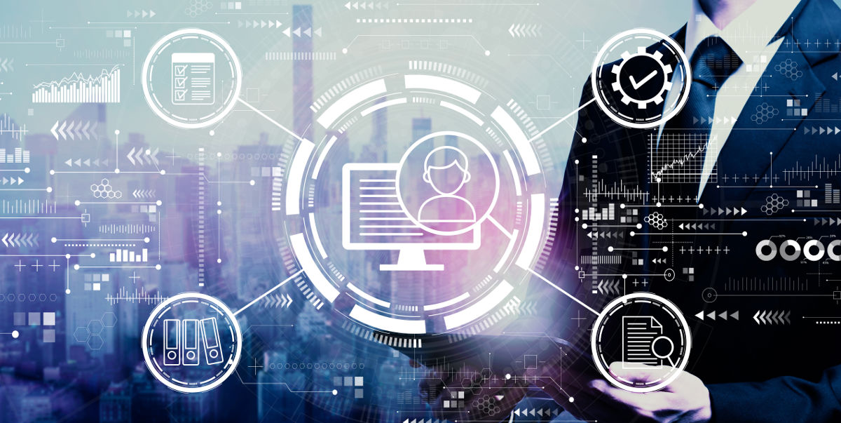 features to look for in a construction management software Document management system concept with businessman holding a tablet computer